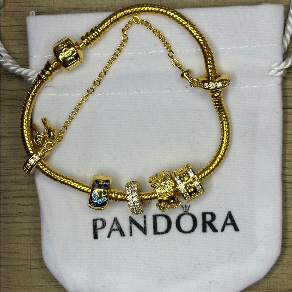 Original Pandora bracelet plated in 14 carats gold.